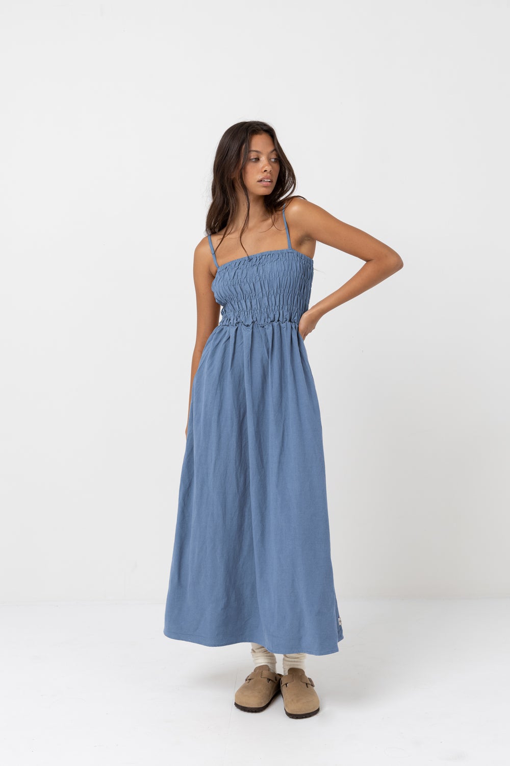 shirred midi dress Navy Print this breezy sundress is perfect for your next summer getaway. Shop Rhythm Classic Shirred Midi
